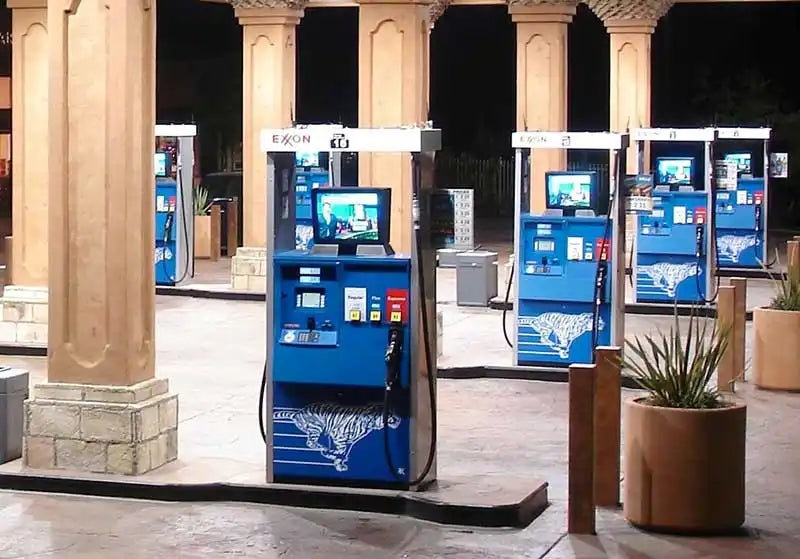 Blue parking payment kiosk with a digital display screen.